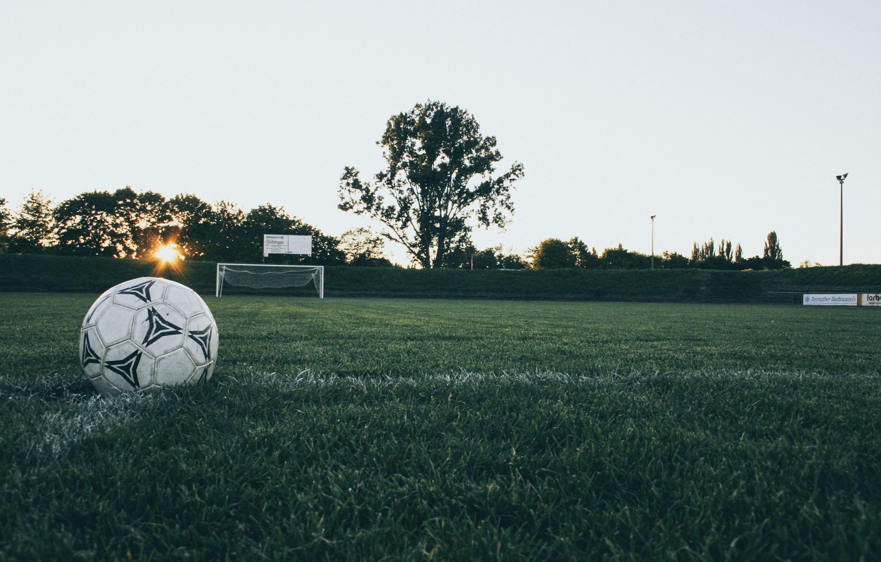 Players on a community sports pitch